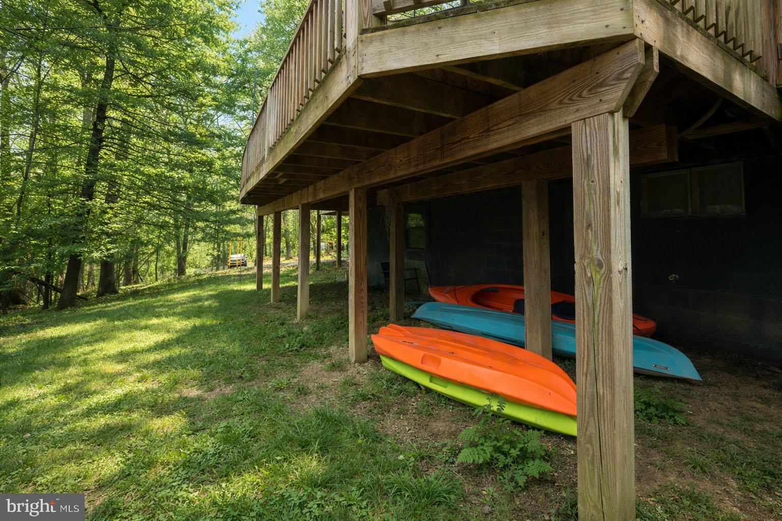 527 Deer Run Lane Swanton, MD 21561 - Photo 51 of 51 a view of backyard with large trees and a small yard