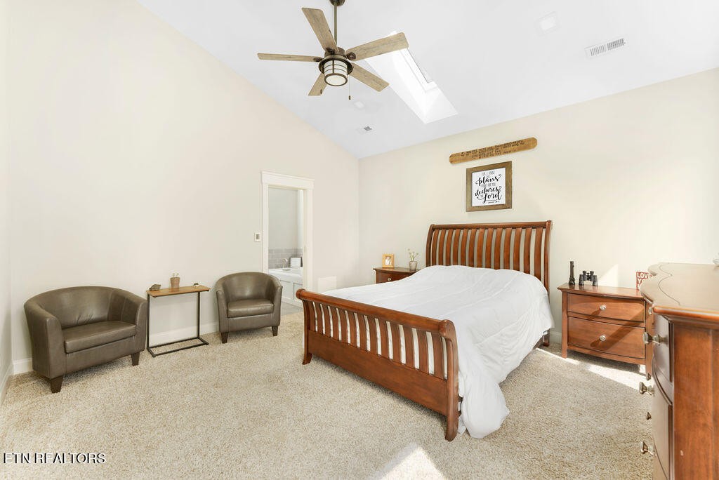 9760 Chestnut Ridge Road Heiskell, TN 37754 - Photo 14 of 59 a bedroom with bed and window