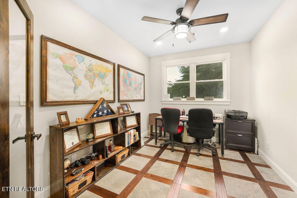 9760 Chestnut Ridge Road Heiskell, TN 37754 - Photo 29 of 59 a view of a workspace with furniture and a window