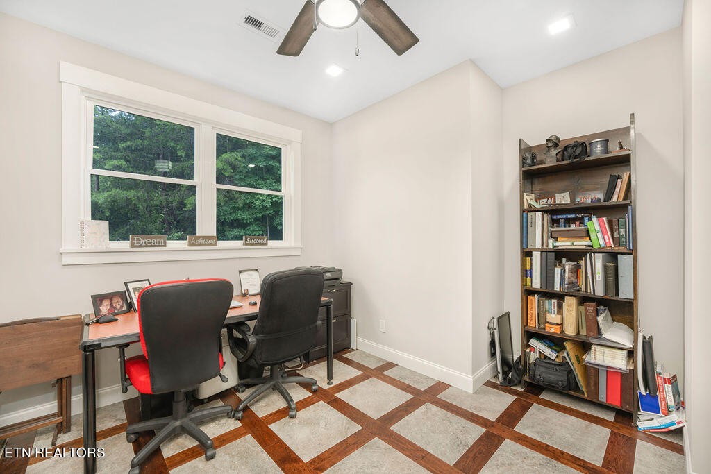9760 Chestnut Ridge Road Heiskell, TN 37754 - Photo 31 of 59 a view of a workspace with furniture and a window