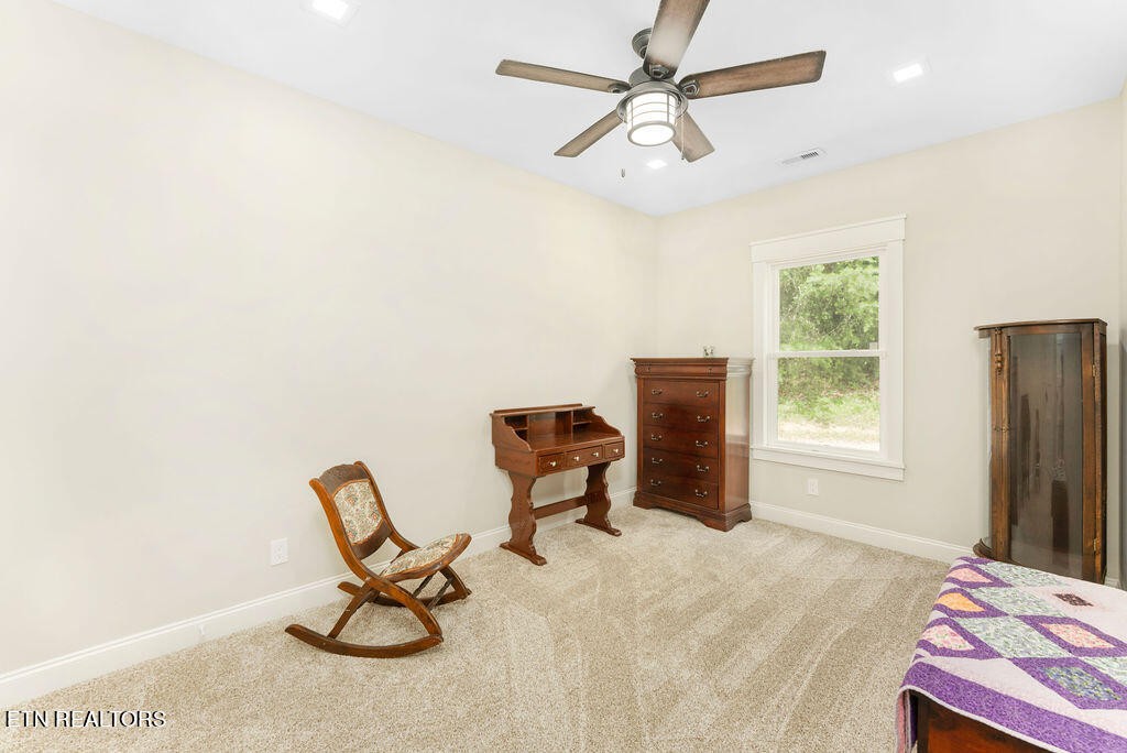 9760 Chestnut Ridge Road Heiskell, TN 37754 - Photo 34 of 59 a view of a workspace with furniture and a window