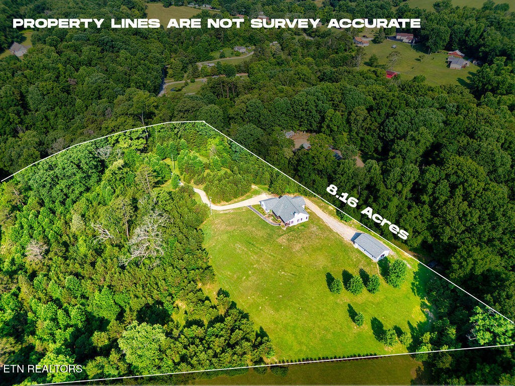 9760 Chestnut Ridge Road Heiskell, TN 37754 - Photo 35 of 59 a view of a swimming pool