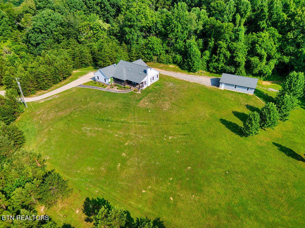 9760 Chestnut Ridge Road Heiskell, TN 37754 - Photo 41 of 59 a view of a back yard