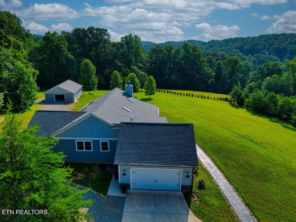 9760 Chestnut Ridge Road Heiskell, TN 37754 - Photo 42 of 59 an aerial view of a house