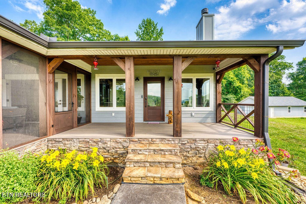 9760 Chestnut Ridge Road Heiskell, TN 37754 - Photo 59 of 59 a view of a house with a swimming pool