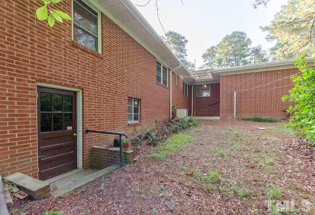 401 West Cornwallis Road Durham, NC 27707 - Photo 4 of 10 Basement has exterior entrance.
