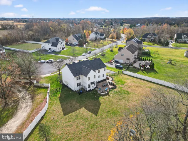 a view of a dinning table and chairs in the patio