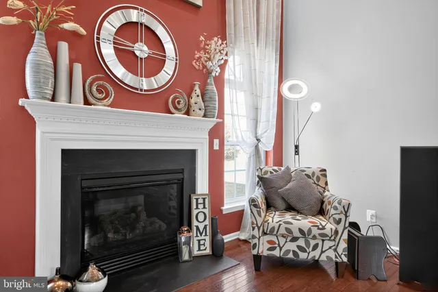 a kitchen with stainless steel appliances granite countertop a stove a sink a refrigerator and a microwave