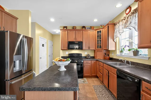 a bathroom with a sink mirror and toilet