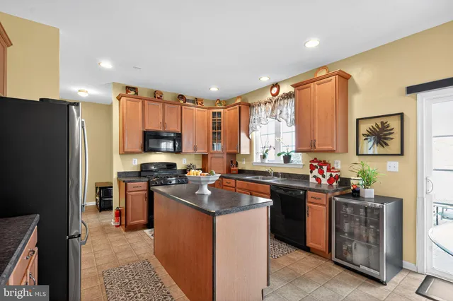 a bathroom with a double vanity sink mirror and shower