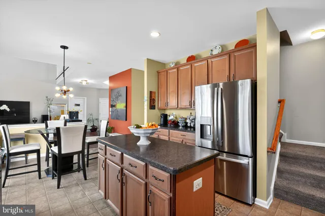 a very nice looking room with a large window and chandelier