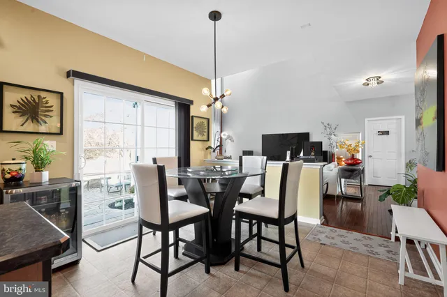 an aerial view of a house with garden space and ocean view
