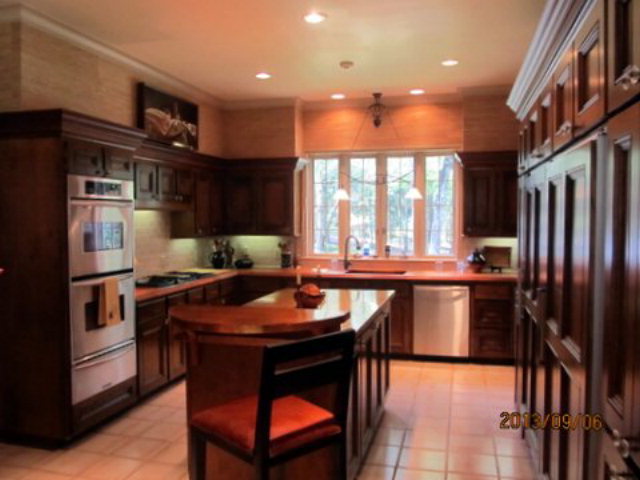5150 Zebulon Road Macon, GA 31210 - Photo 12 of 33 a kitchen with stainless steel appliances granite countertop a stove refrigerator sink and cabinets