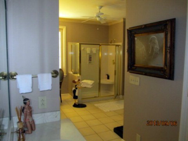 5150 Zebulon Road Macon, GA 31210 - Photo 22 of 33 a bathroom with a tub and shower