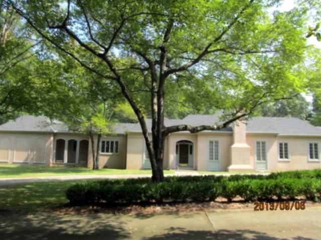 5150 Zebulon Road Macon, GA 31210 - Photo 30 of 33 a front view of a house with a garden