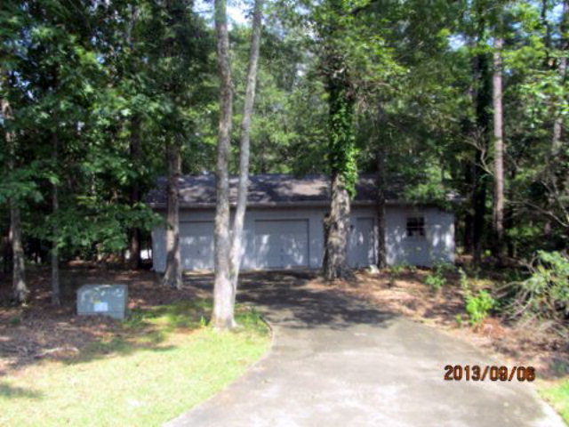 5150 Zebulon Road Macon, GA 31210 - Photo 31 of 33 a backyard of a house with fountain table and chairs