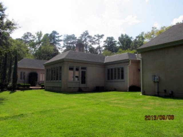 5150 Zebulon Road Macon, GA 31210 - Photo 32 of 33 a front view of house with yard and green space
