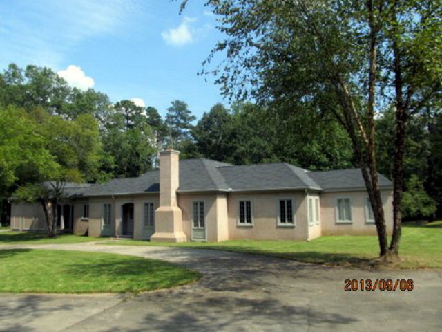 5150 Zebulon Road Macon, GA 31210 - Photo 33 of 33 a front view of a house with a garden