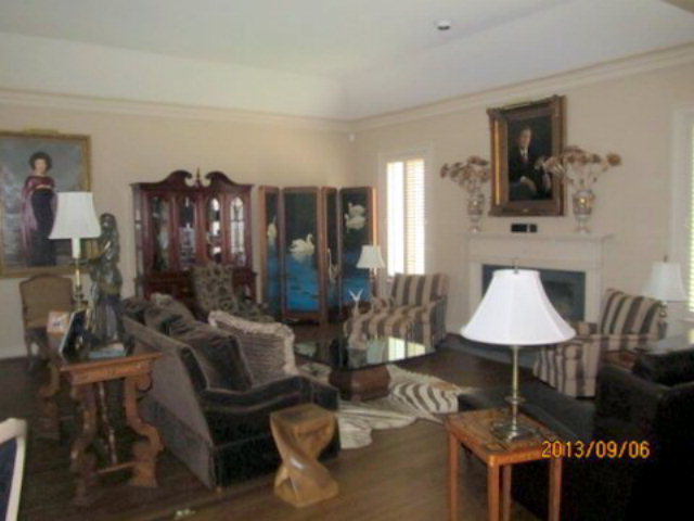 5150 Zebulon Road Macon, GA 31210 - Photo 8 of 33 a living room with furniture a lamp and a window