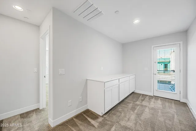 an empty room with windows