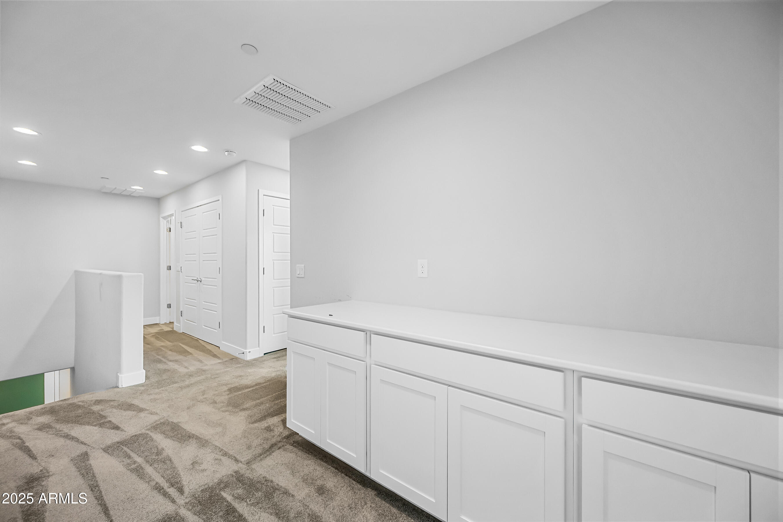 1250 Abbey Lane, Unit 289 Chandler, AZ 85226 - Photo 19 of 36 a view of a kitchen with white cabinets