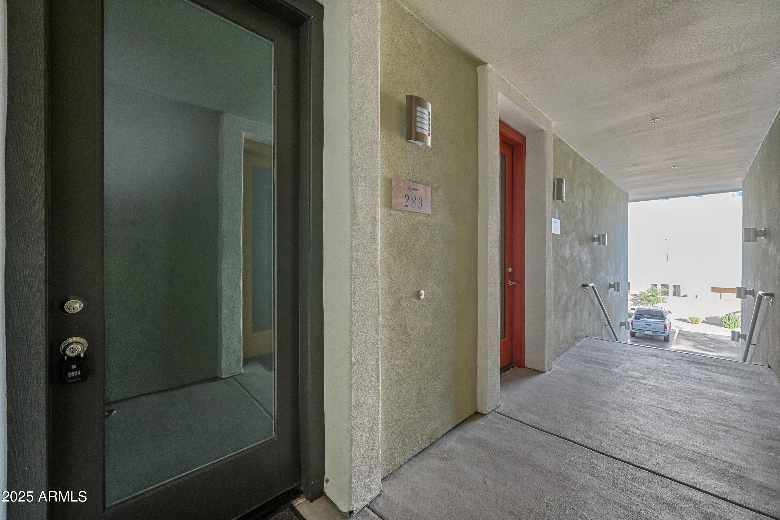 1250 Abbey Lane, Unit 289 Chandler, AZ 85226 - Photo 2 of 36 a view of a hallway with view of bathroom