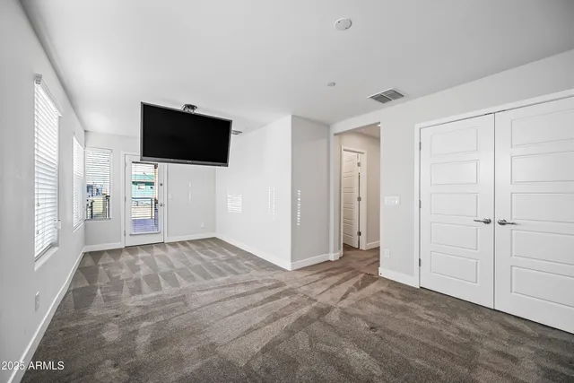 a view of small space with racks on the wall