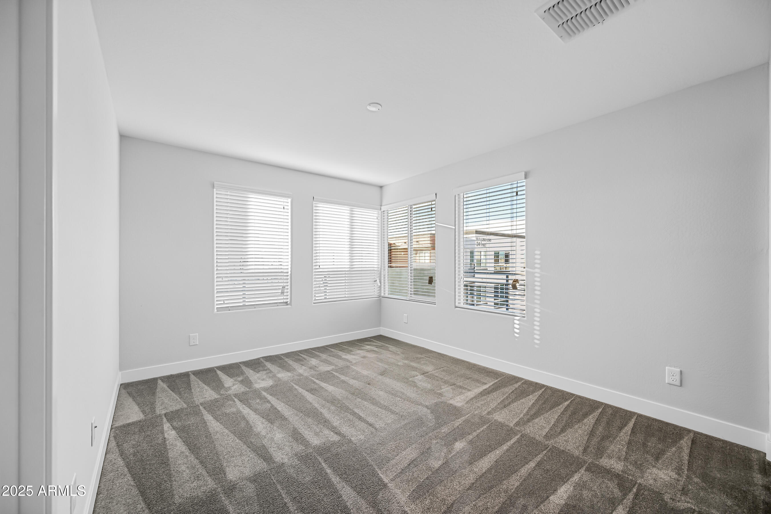 1250 Abbey Lane, Unit 289 Chandler, AZ 85226 - Photo 25 of 36 a view of an empty room with a window
