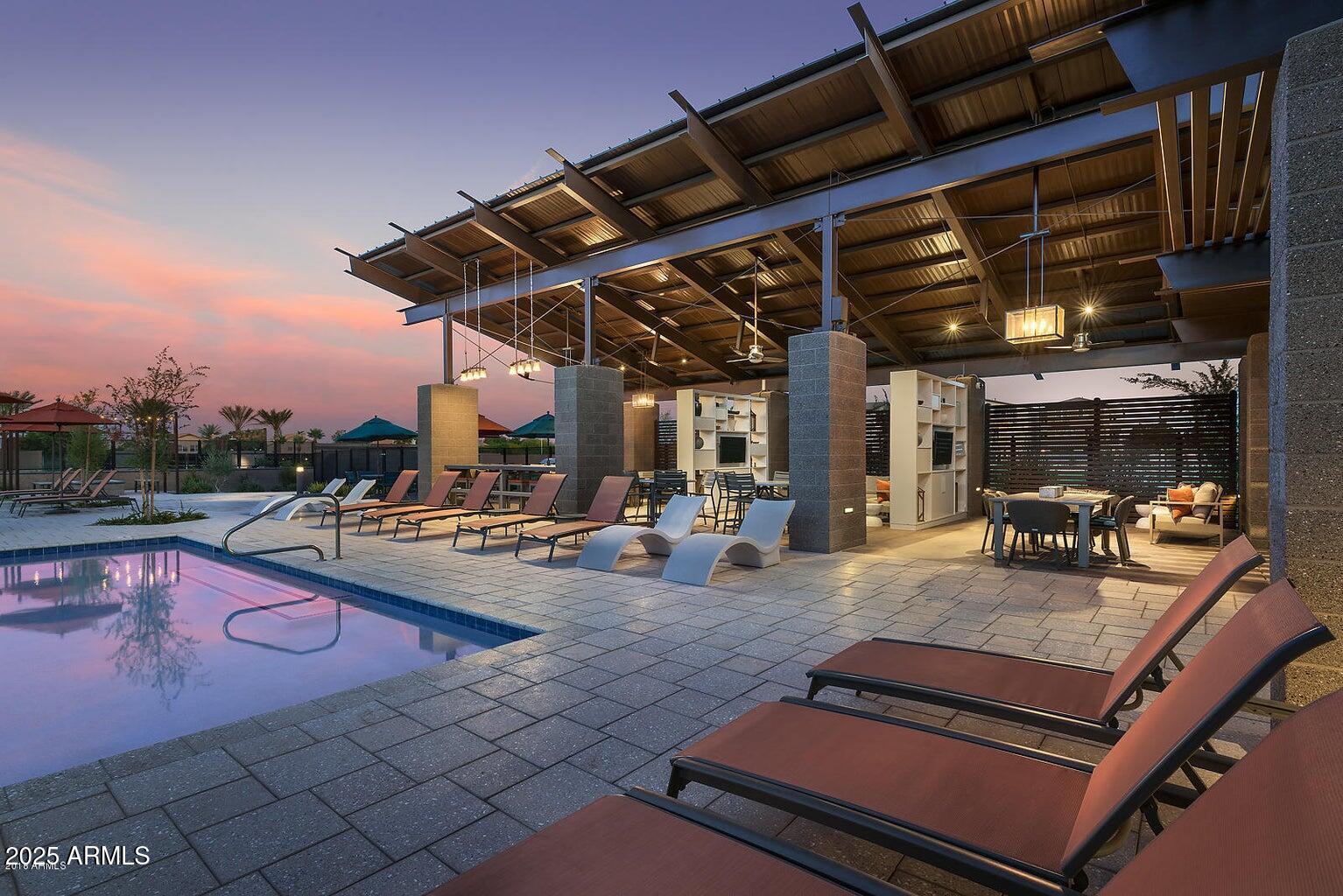 1250 Abbey Lane, Unit 289 Chandler, AZ 85226 - Photo 32 of 36 a view of a swimming pool with a patio