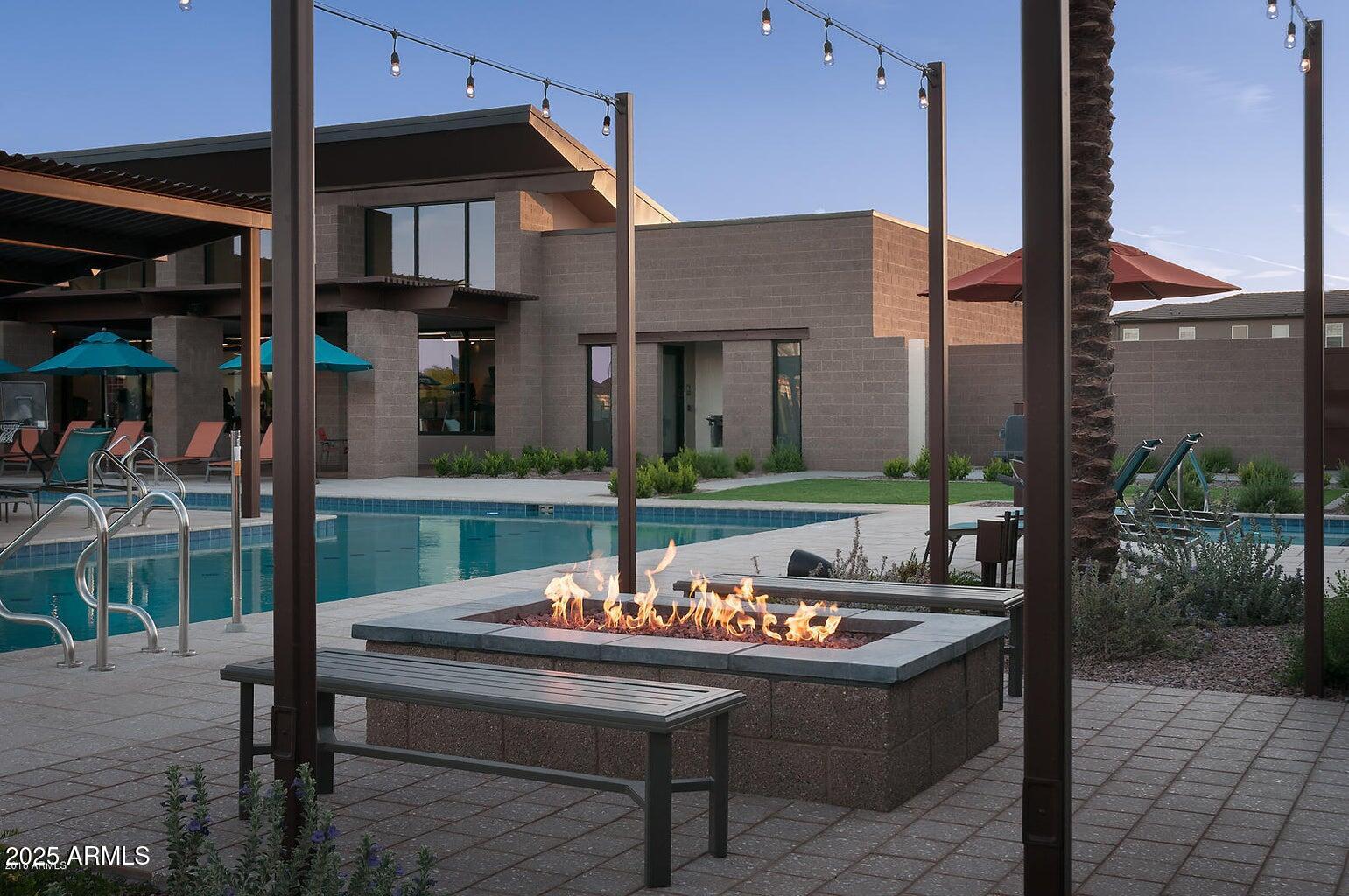 1250 Abbey Lane, Unit 289 Chandler, AZ 85226 - Photo 35 of 36 a view of a chairs and table in the patio