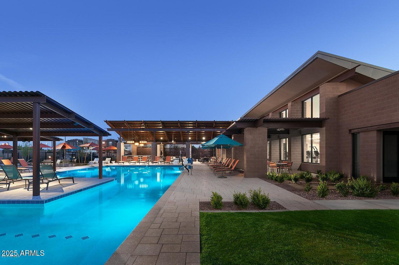 1250 Abbey Lane, Unit 289 Chandler, AZ 85226 - Photo 36 of 36 a front view of a house with a yard