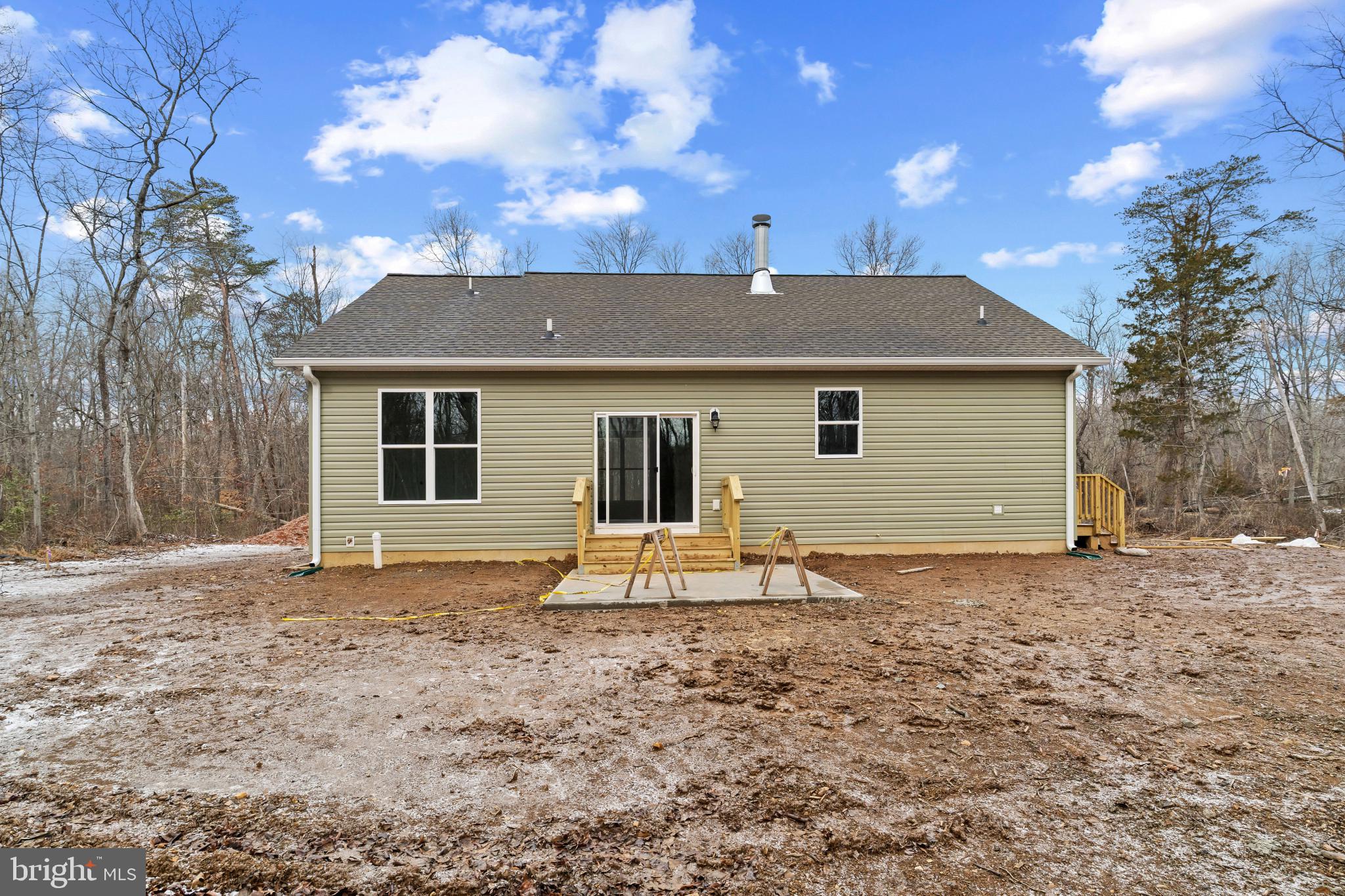 6735 Beverly Road Broad Run, VA 20137 - Photo 25 of 30 Back of property with a shingled roof, a patio are