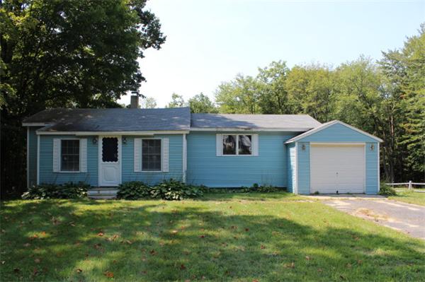 1673 Petersham Road Athol, MA 01331 - Photo 1 of 5 a view of a house with yard and garden