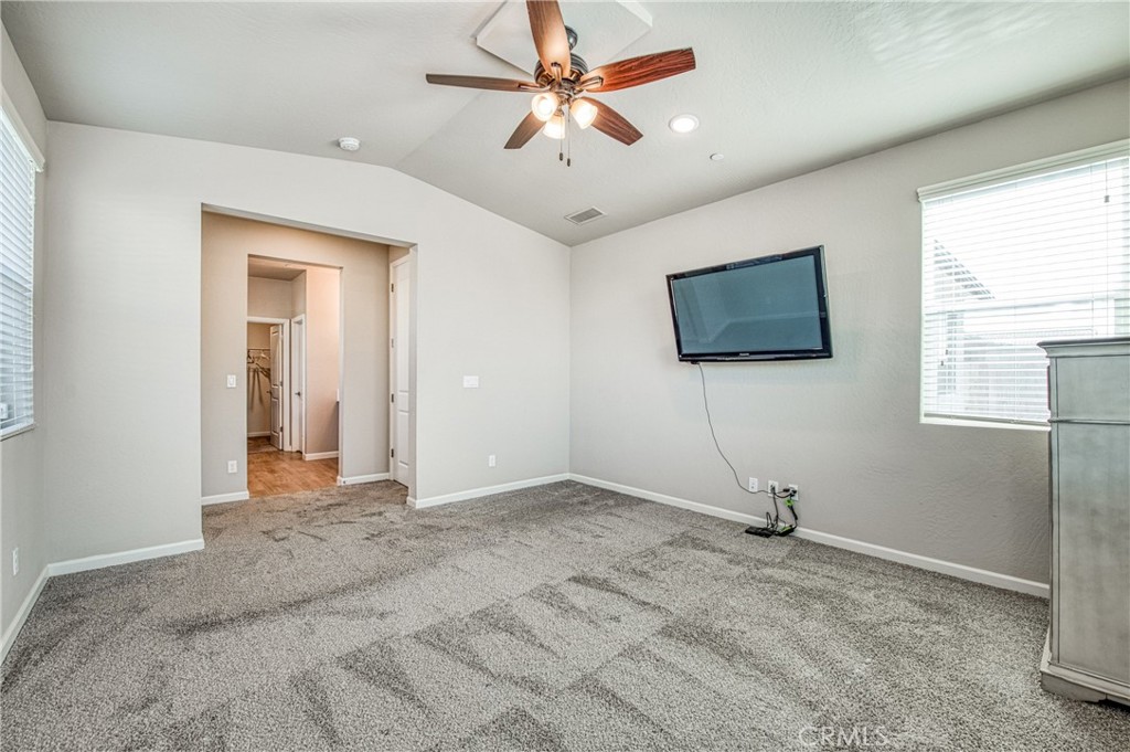 4135 Mecca Avenue Clovis, CA 93619 - Photo 18 of 32 a view of a livingroom with a flat screen tv