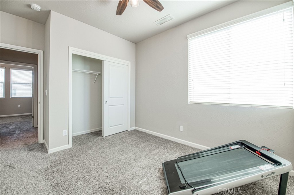 4135 Mecca Avenue Clovis, CA 93619 - Photo 26 of 32 an empty room with windows