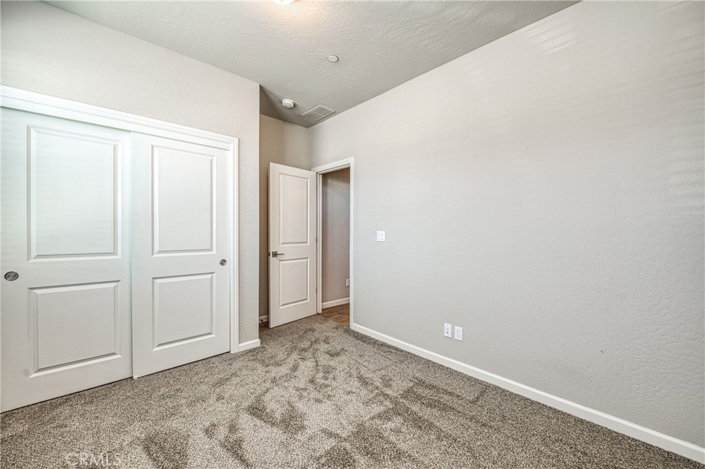 4135 Mecca Avenue Clovis, CA 93619 - Photo 5 of 32 a view of an empty room