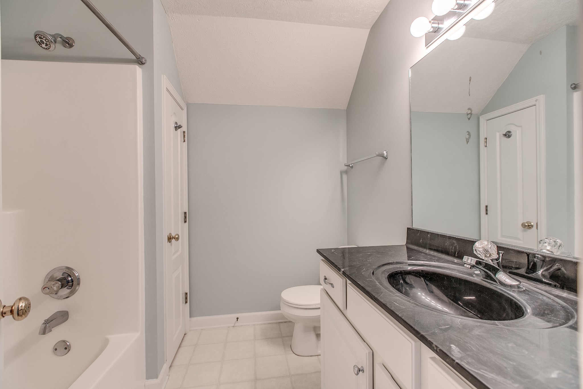 206 Sayre Lane Murfreesboro, TN 37127 - Photo 28 of 29 a bathroom with a sink a toilet and shower