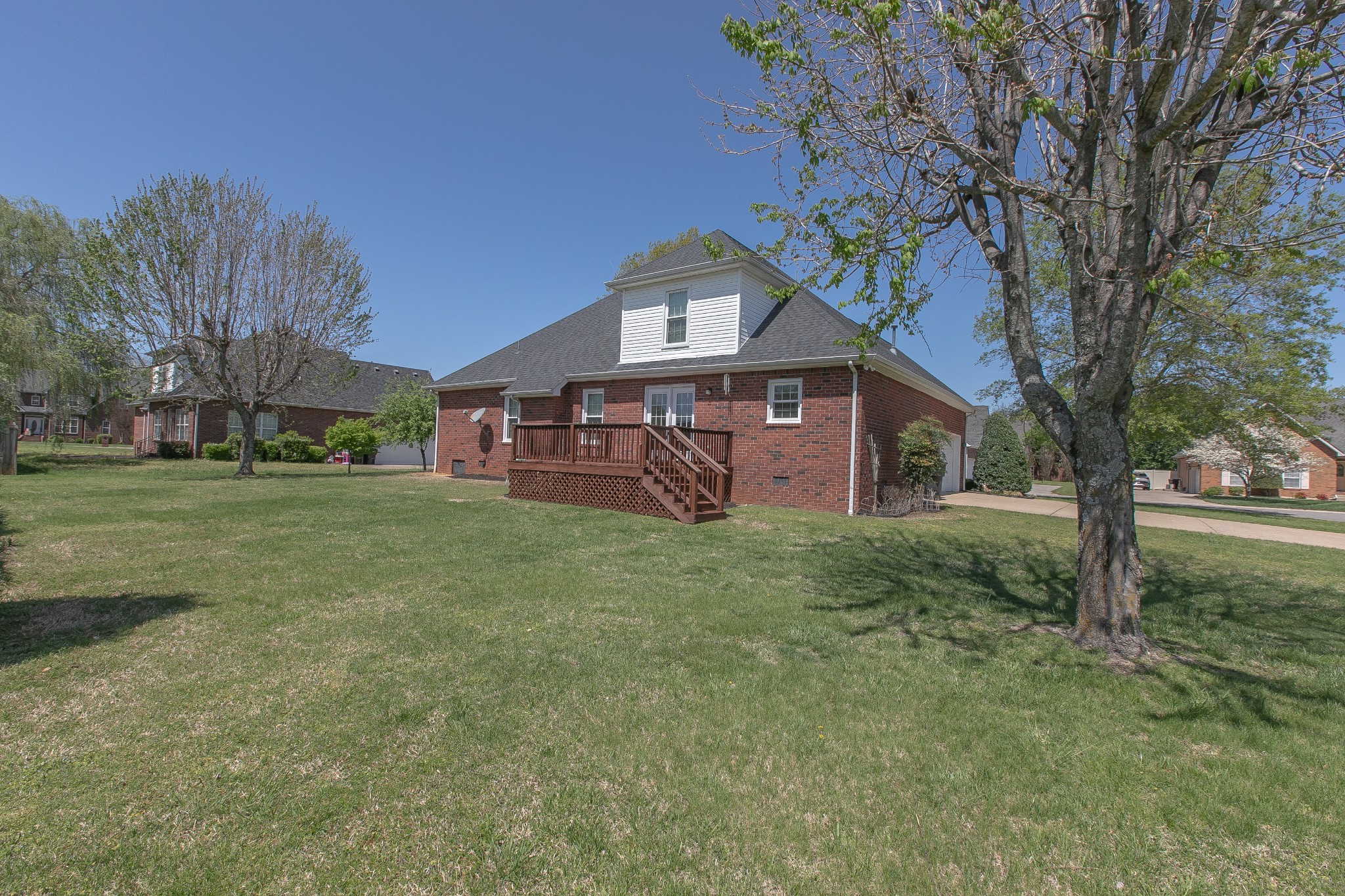 206 Sayre Lane Murfreesboro, TN 37127 - Photo 5 of 29 a front view of a house with garden
