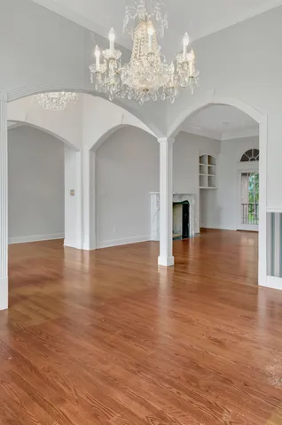 a view of a livingroom with wooden floor