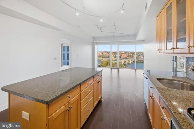 a kitchen with a stove and a sink