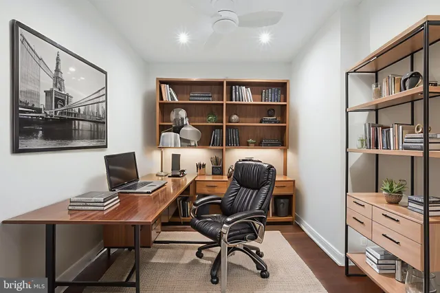a view of a workspace with furniture