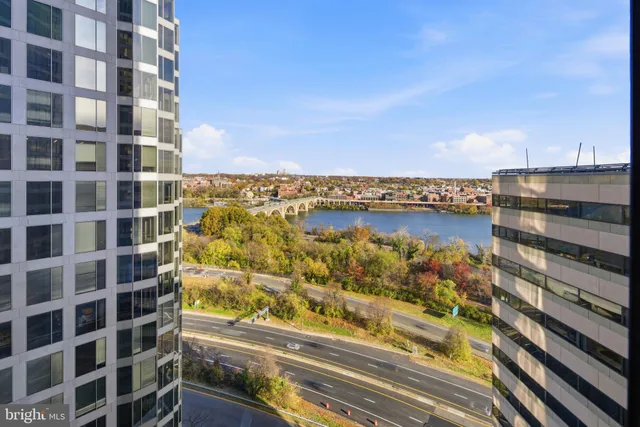 a view of a city with tall buildings
