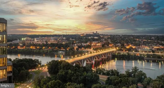 an aerial view of residential building and lake view