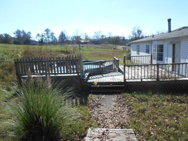 2131 Strawhill Road Southeast Cleveland, TN 37323 - Photo 6 of 20 a view of a lake with a garden