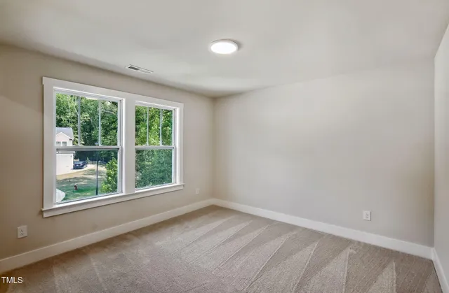 an empty room with a window