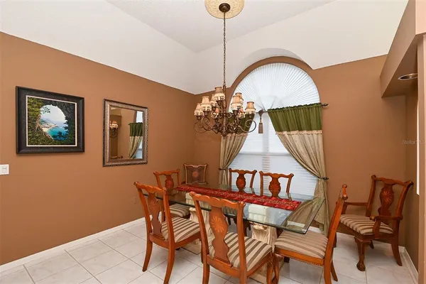 a room with painting and a table