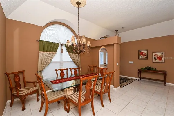 a kitchen with a stove and a microwave