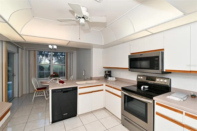 a view of a livingroom with furniture and porch