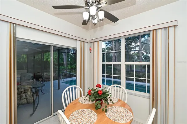a kitchen with a sink appliances and cabinets