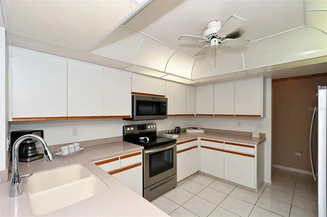 a bedroom with bed and a fireplace